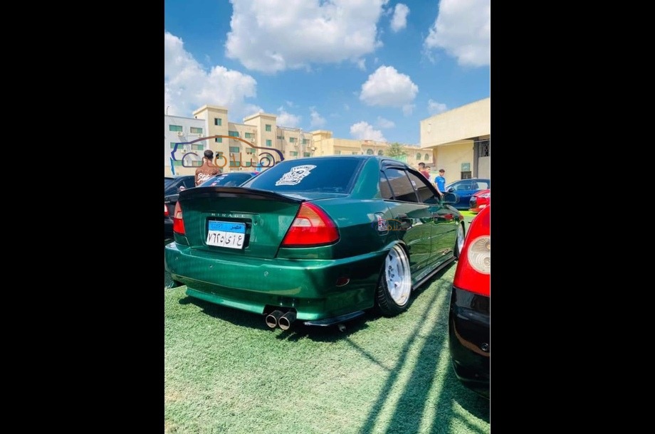 Lancer Crystala Mitsubishi Dark green