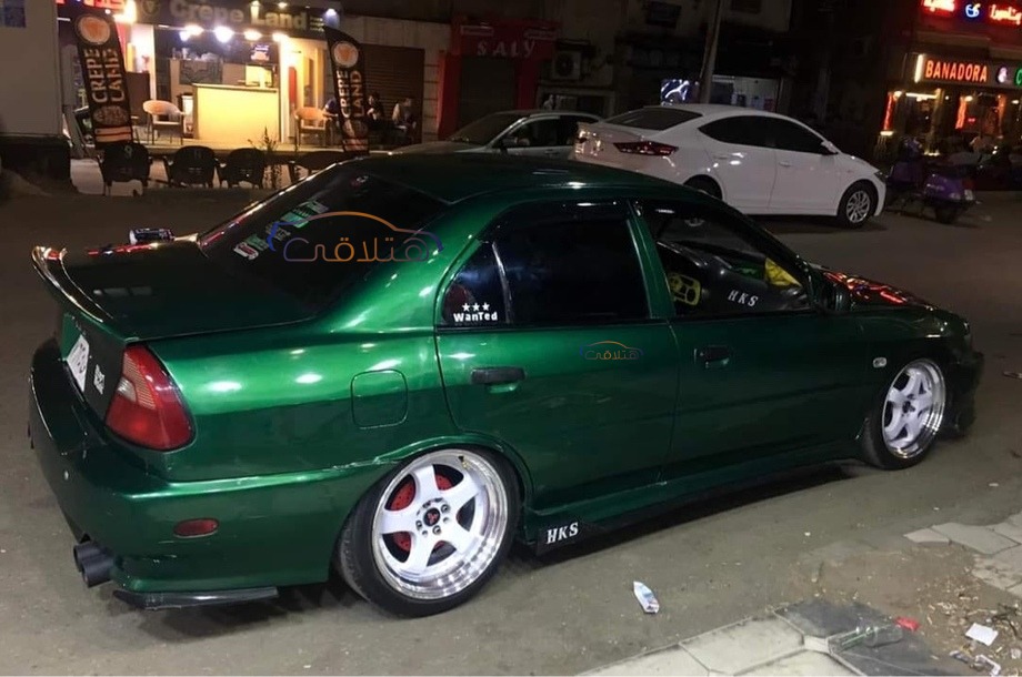 Lancer Crystala Mitsubishi Dark green