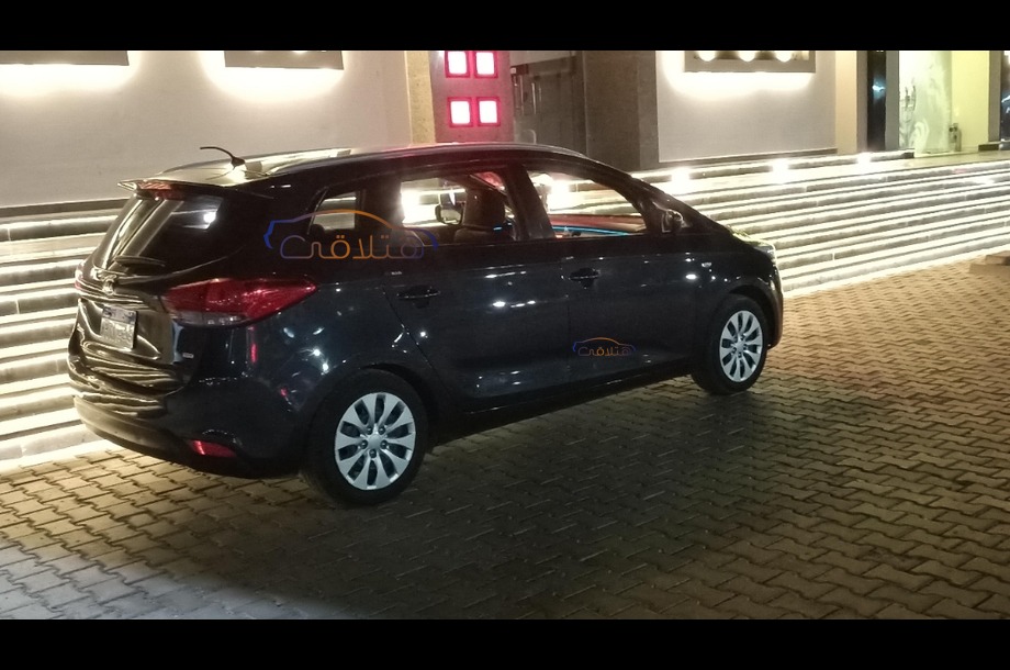 Carens Kia الأزرق الداكن