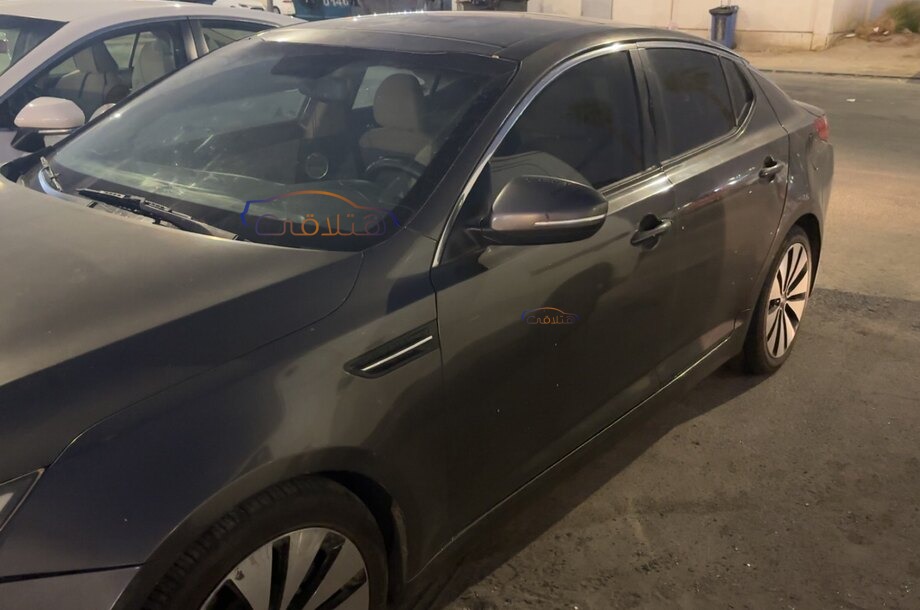 Optima Kia اخضر غامق