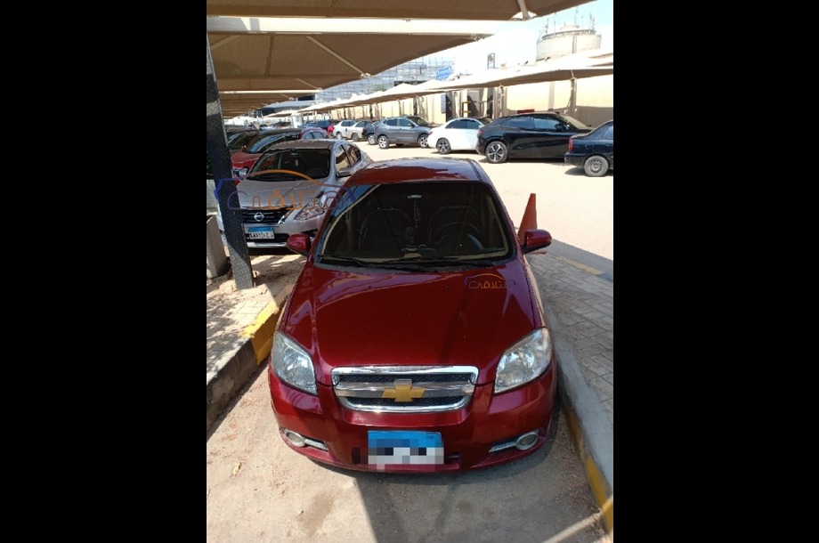 Aveo Chevrolet احمر غامق