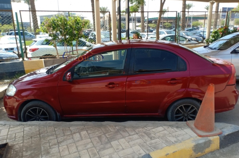 Aveo Chevrolet احمر غامق