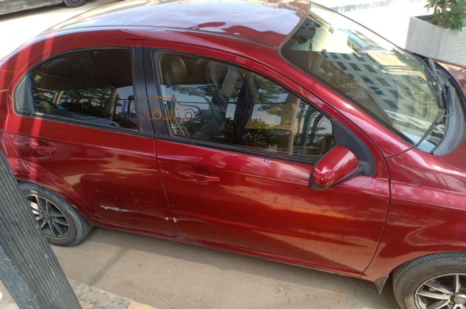 Aveo Chevrolet احمر غامق