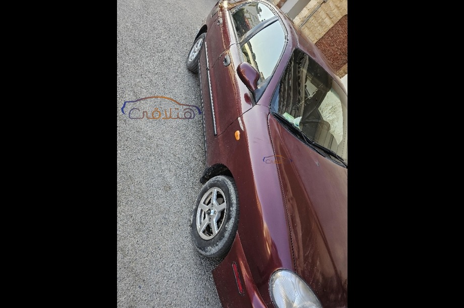 Lanos Chevrolet احمر غامق