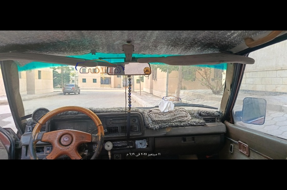 323 Mazda احمر غامق