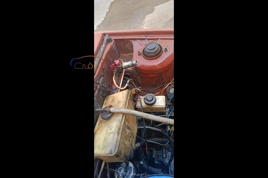 323 Mazda احمر غامق