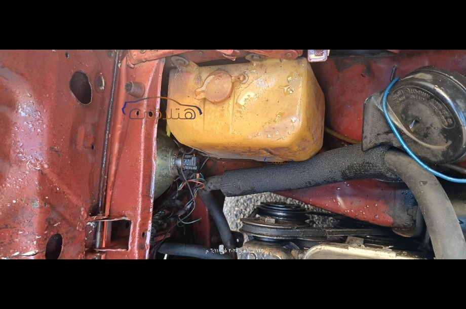 323 Mazda احمر غامق