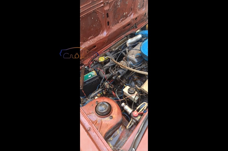 323 Mazda احمر غامق