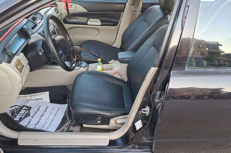 Lancer Puma Mitsubishi أسود