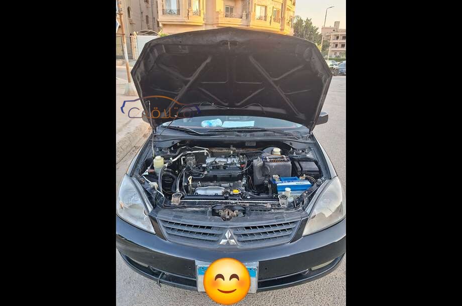 Lancer Puma Mitsubishi أسود