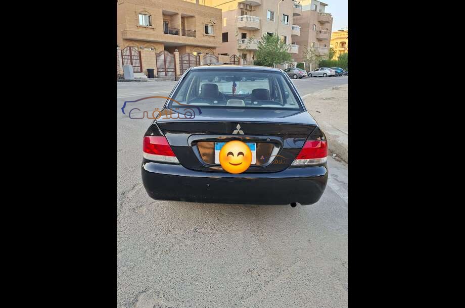Lancer Puma Mitsubishi أسود