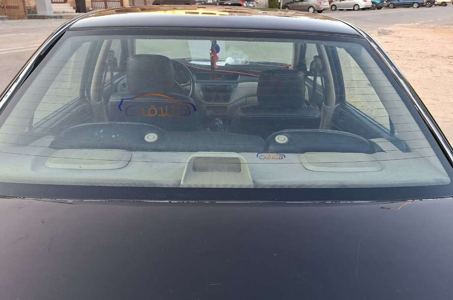 Lancer Puma Mitsubishi أسود