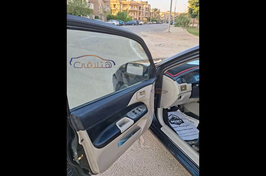 Lancer Puma Mitsubishi أسود