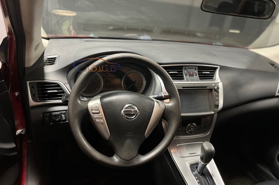 Tiida Nissan احمر