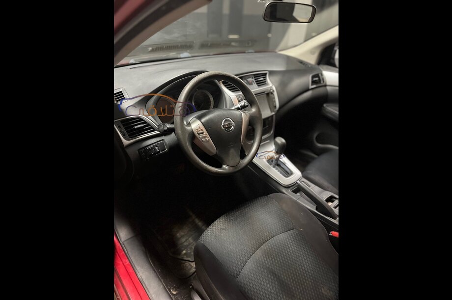 Tiida Nissan احمر