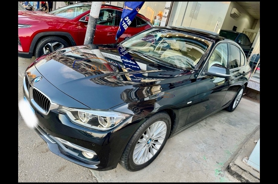 320 BMW أسود