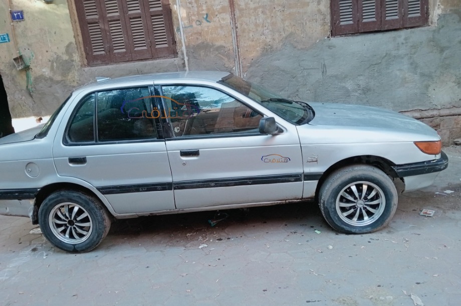 Lancer Mitsubishi فضي