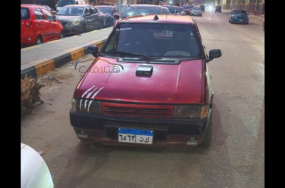 Uno Fiat Dark red