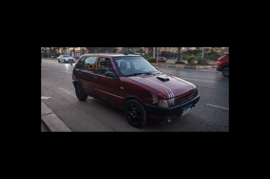 Uno Fiat Dark red