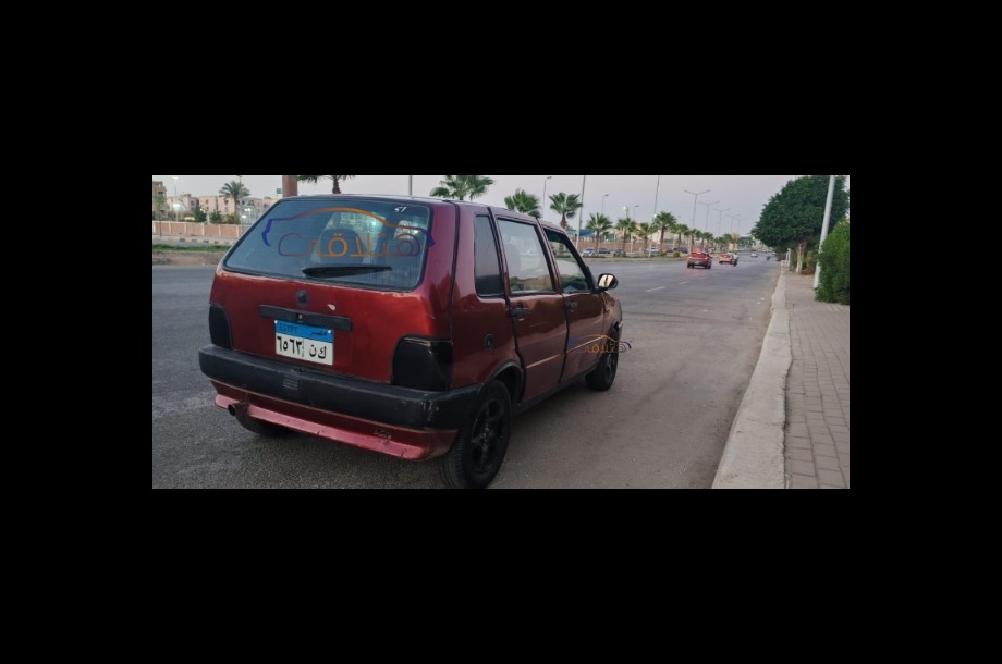 Uno Fiat Dark red