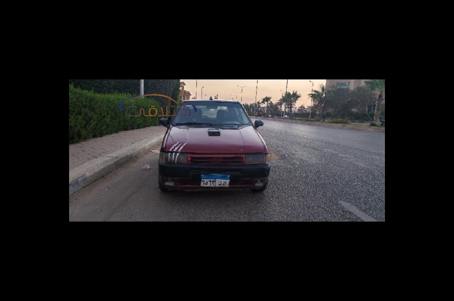 Uno Fiat Dark red