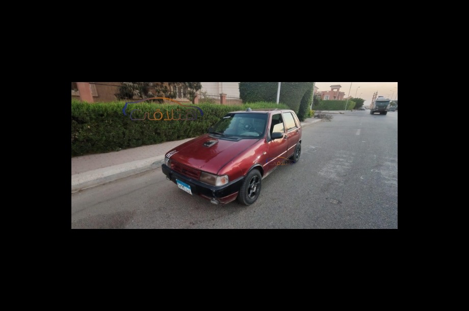 Uno Fiat Dark red