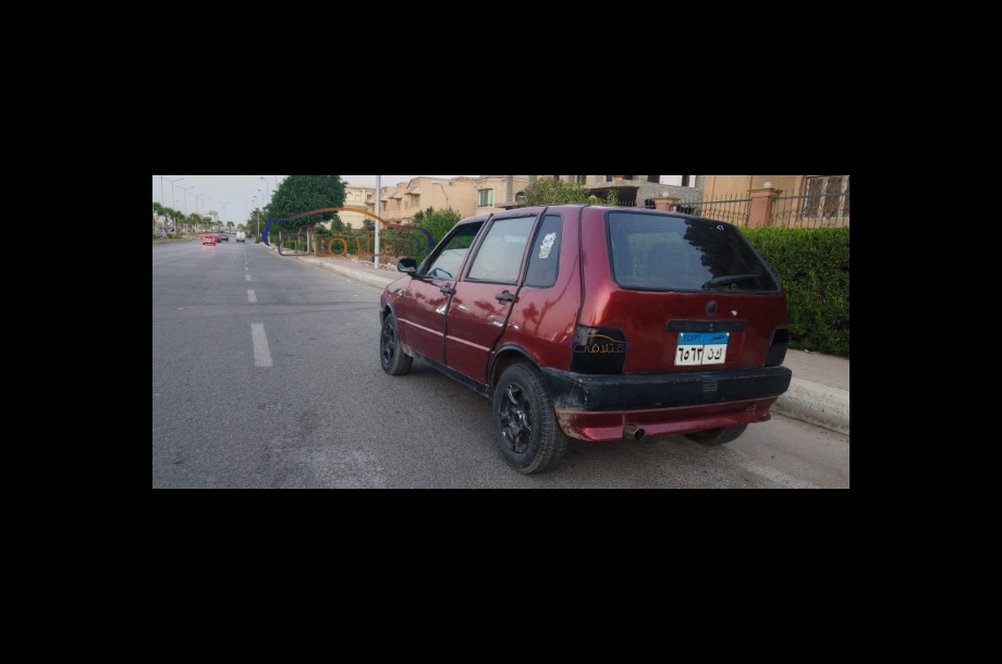 Uno Fiat Dark red
