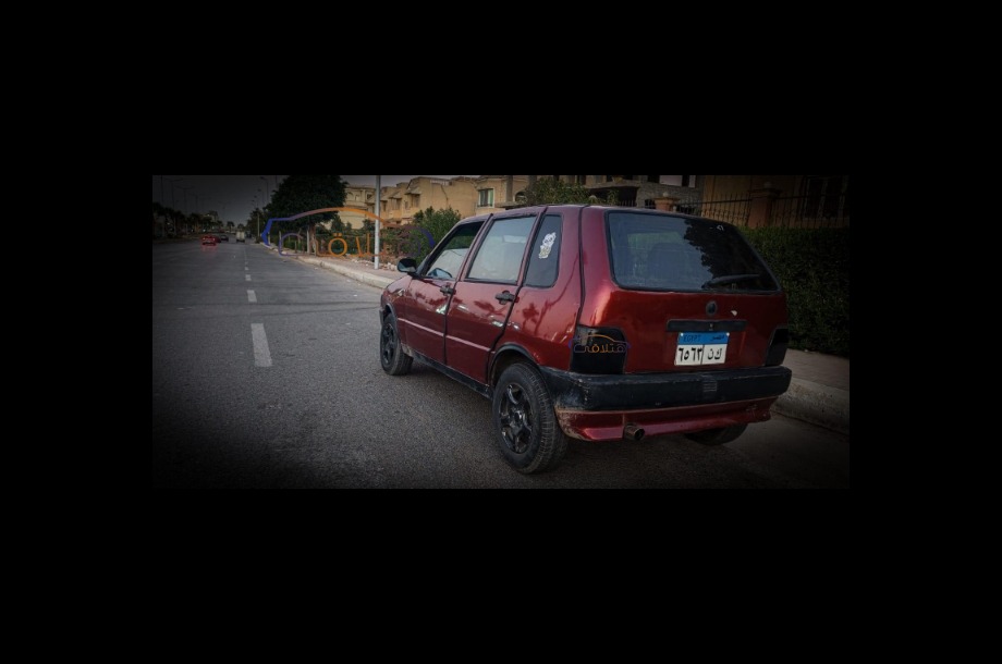 Uno Fiat Dark red