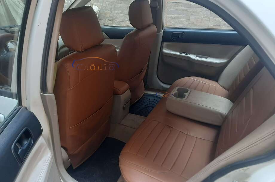 Lancer Puma Mitsubishi أبيض