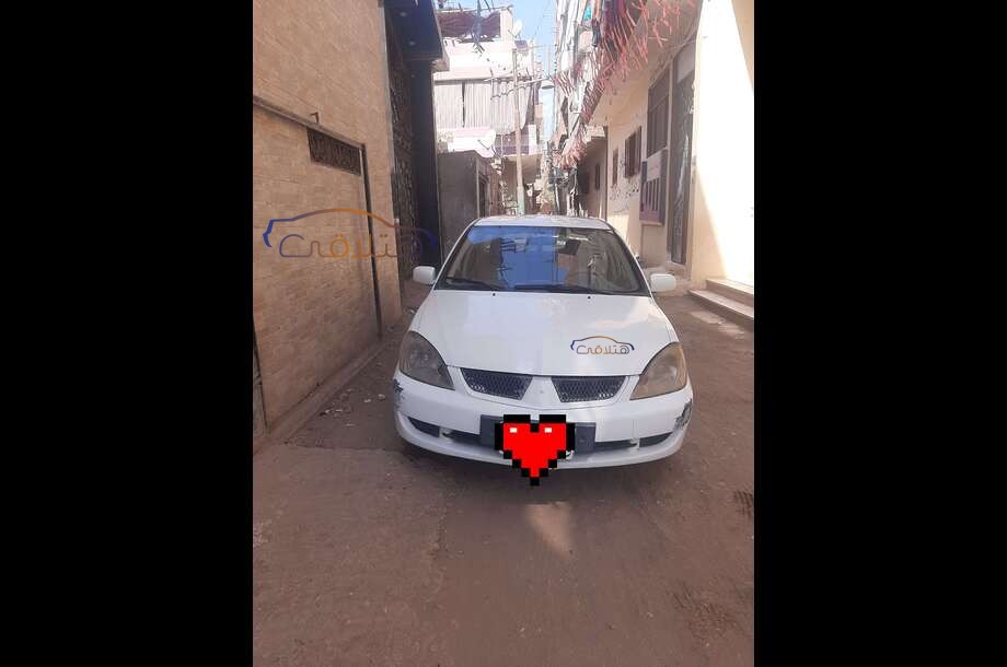 Lancer Puma Mitsubishi أبيض