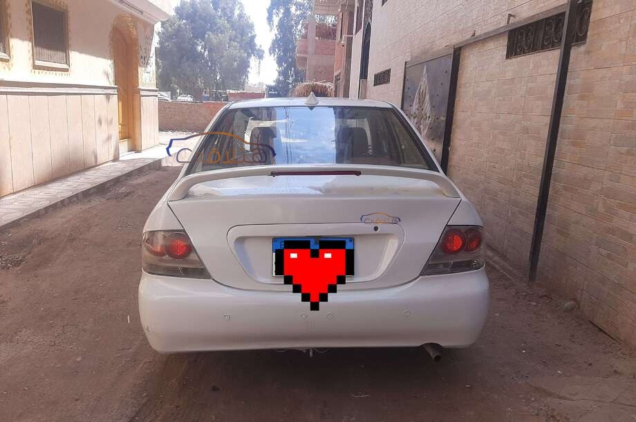 Lancer Puma Mitsubishi أبيض