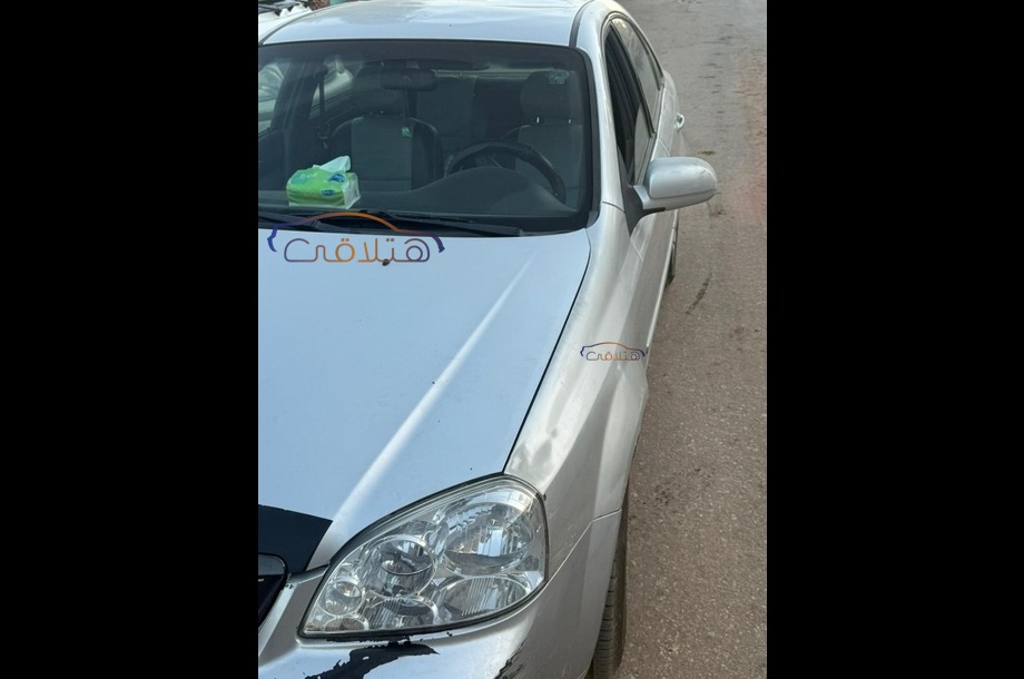 Optra Chevrolet فضي