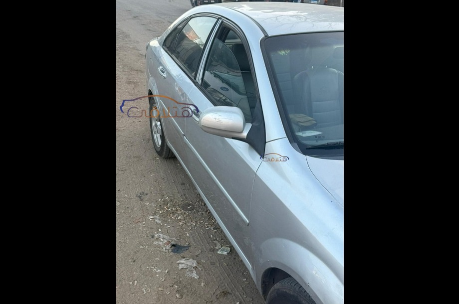 Optra Chevrolet فضي