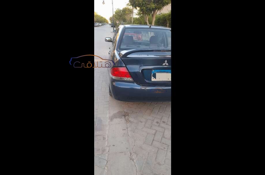 Lancer Puma Mitsubishi أزرق