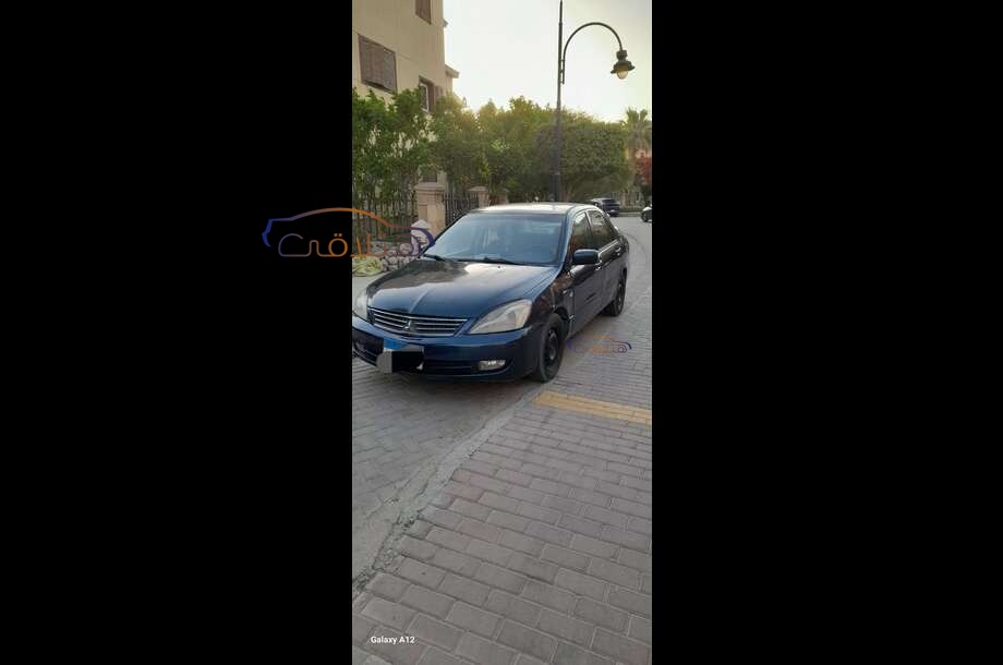 Lancer Puma Mitsubishi أزرق