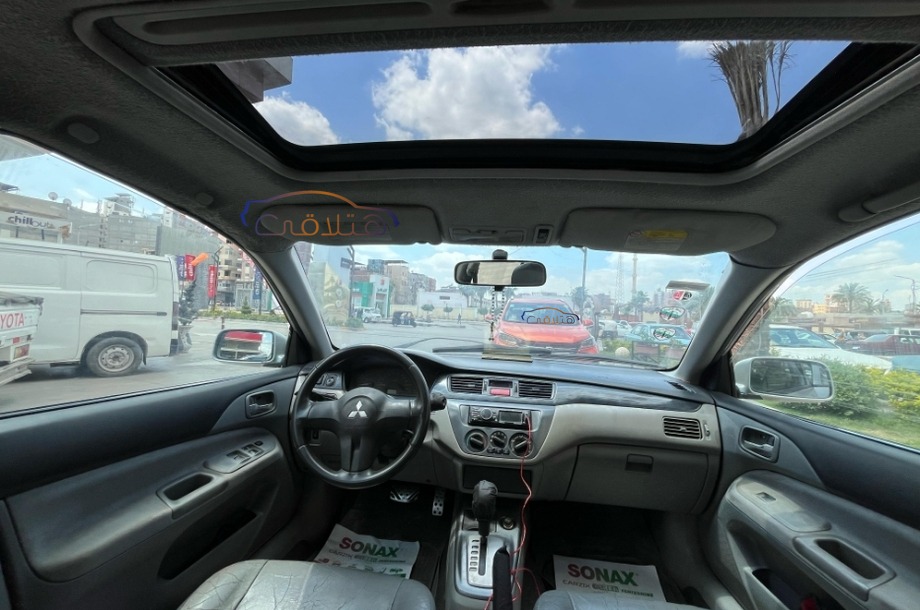 Lancer Puma Mitsubishi فضي