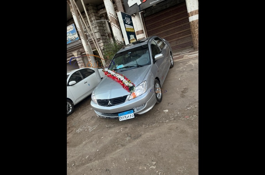 Lancer Puma Mitsubishi فضي