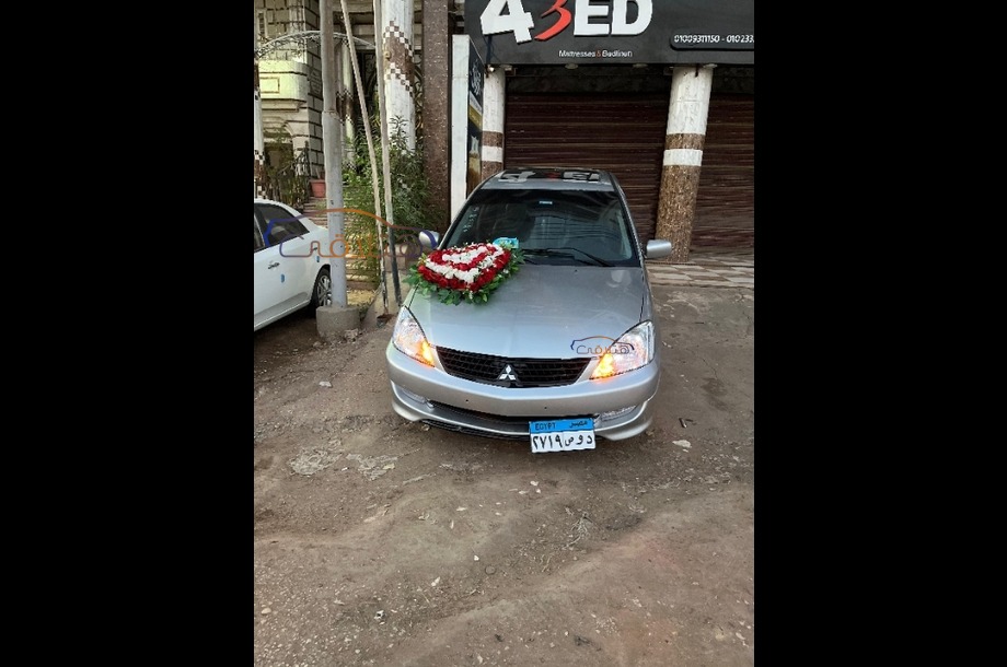 Lancer Puma Mitsubishi فضي