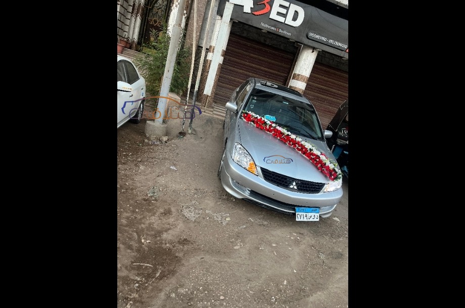 Lancer Puma Mitsubishi فضي