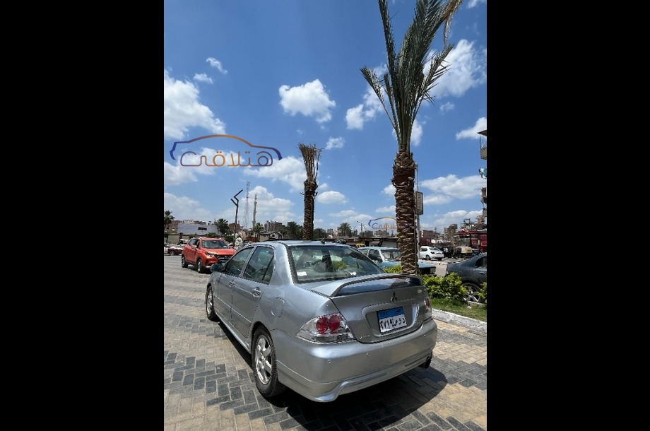 Lancer Puma Mitsubishi فضي