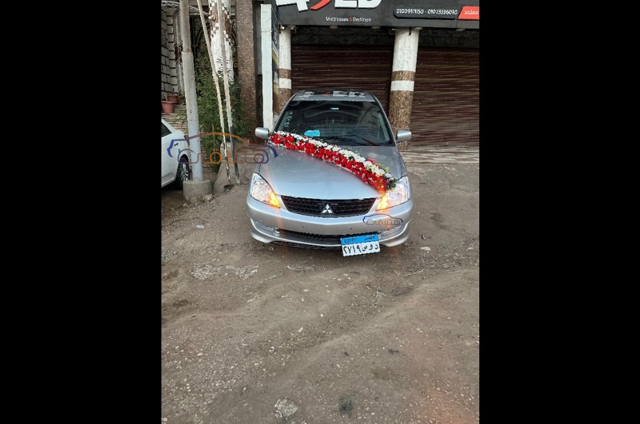 Lancer Puma Mitsubishi فضي