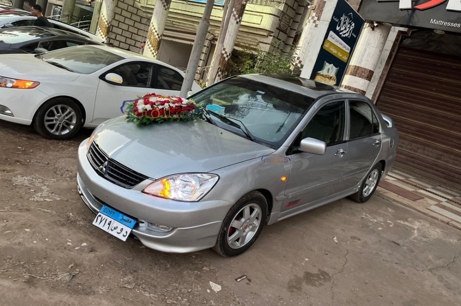 Lancer Puma Mitsubishi فضي