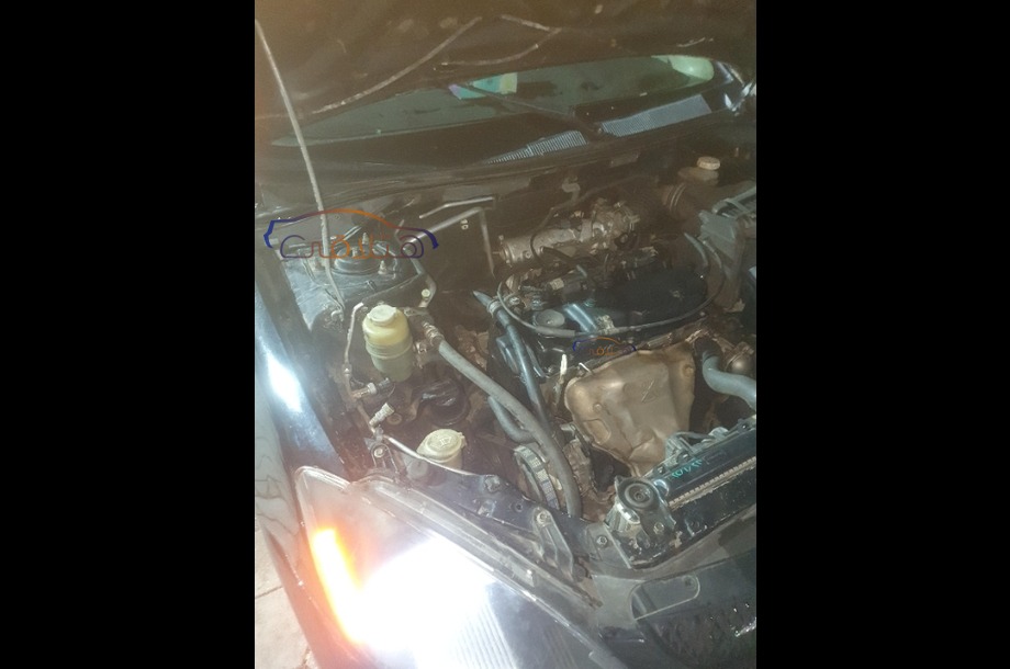 Lancer Puma Mitsubishi أسود