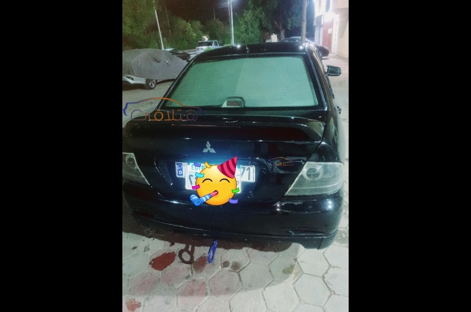 Lancer Puma Mitsubishi أسود