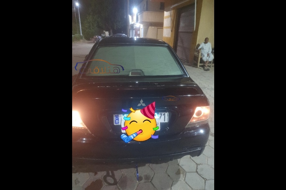 Lancer Puma Mitsubishi أسود