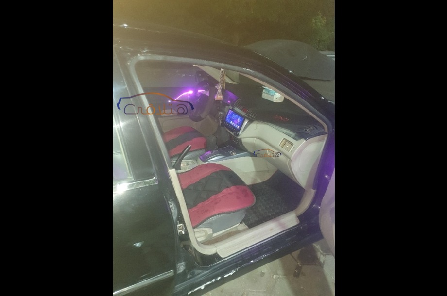 Lancer Puma Mitsubishi أسود