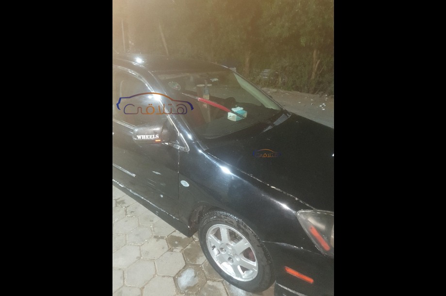 Lancer Puma Mitsubishi أسود