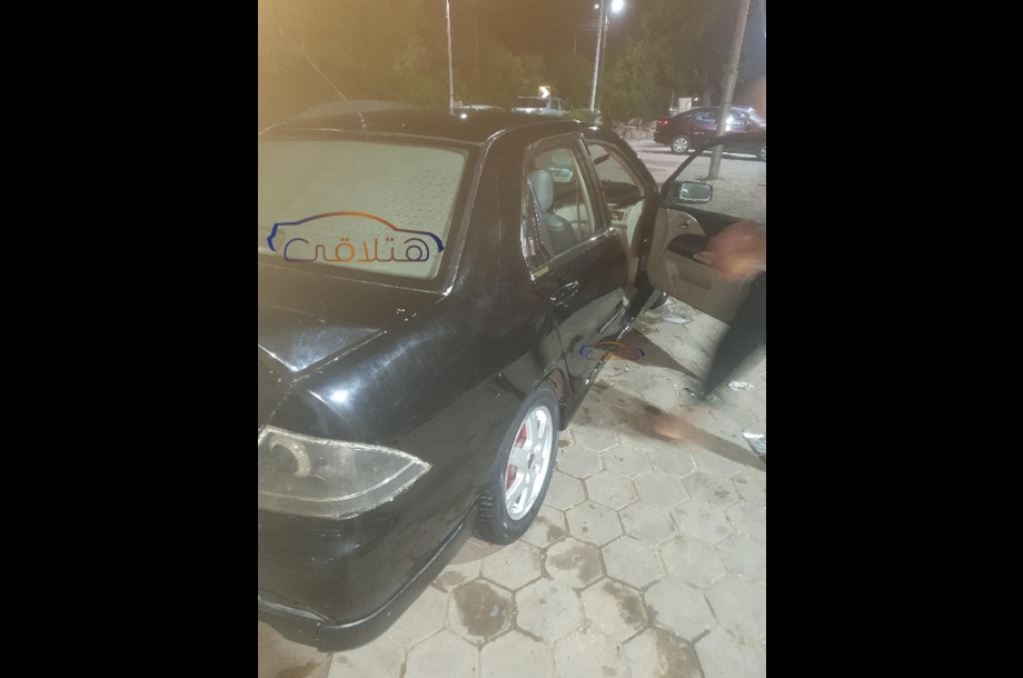 Lancer Puma Mitsubishi أسود