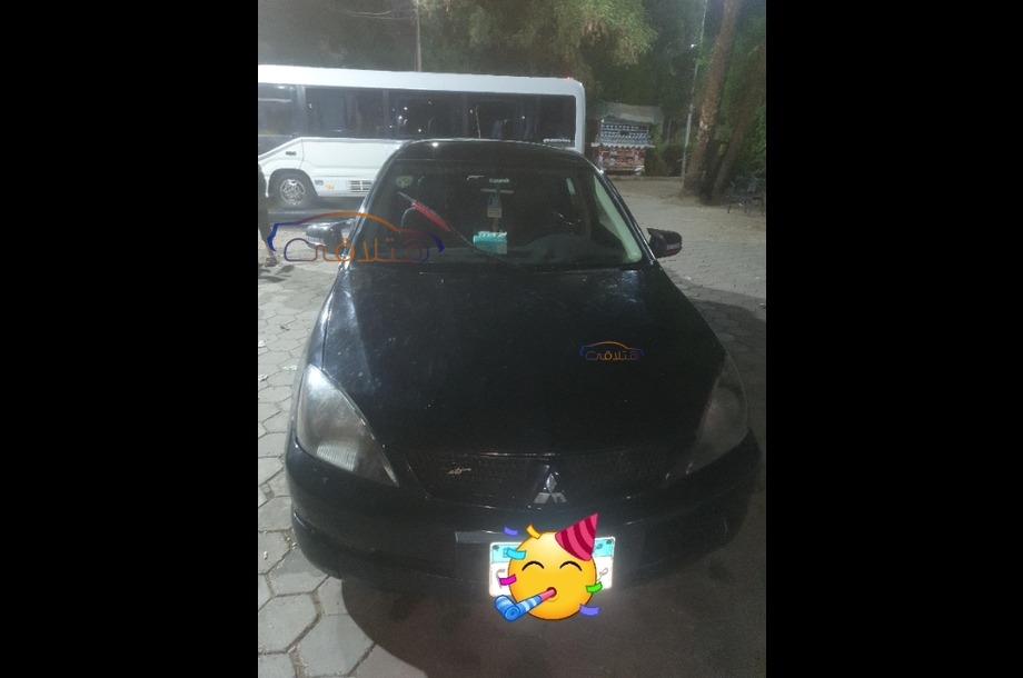 Lancer Puma Mitsubishi أسود