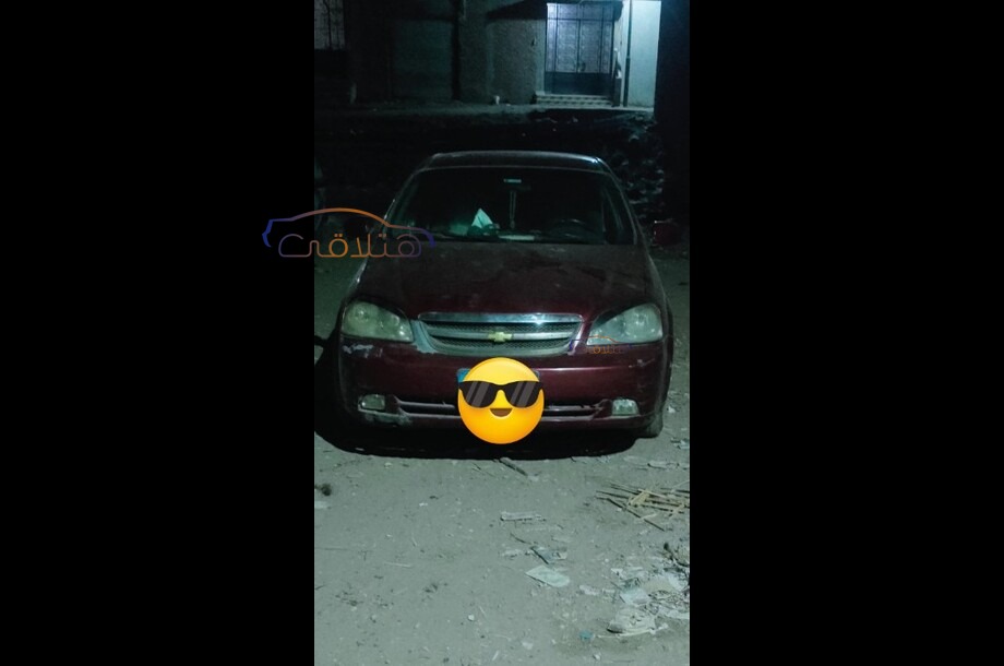 Optra Chevrolet احمر غامق